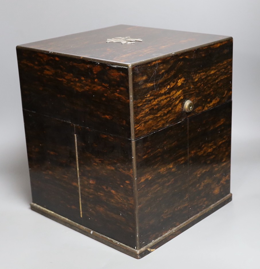 A Mappin & Webb coromandel decanter box with blue velvet lining. 32cm tall, four associated cut glass decanter and stoppers